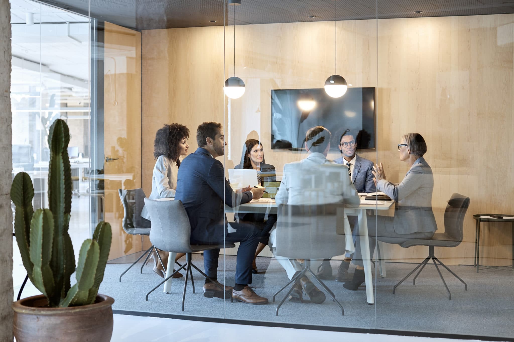 Senior businesswoman explaining strategy at office
